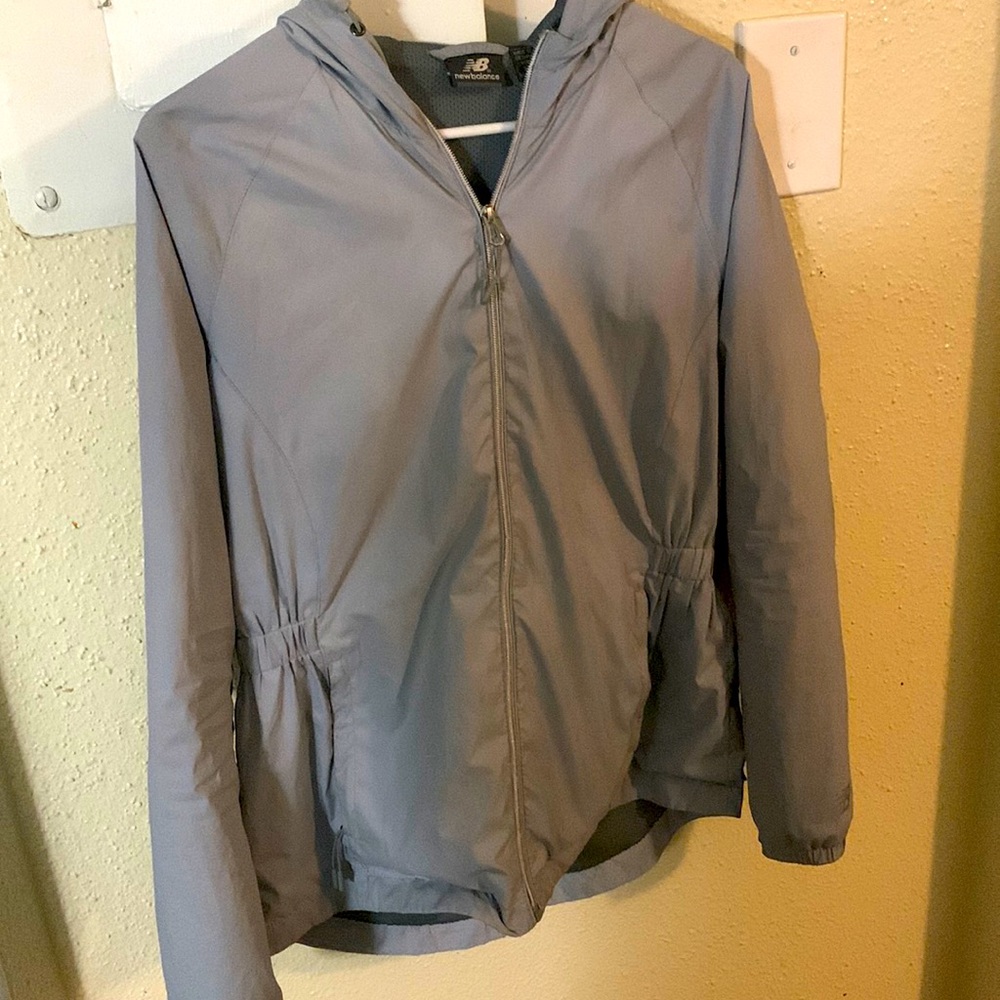 A grey sweat jacket